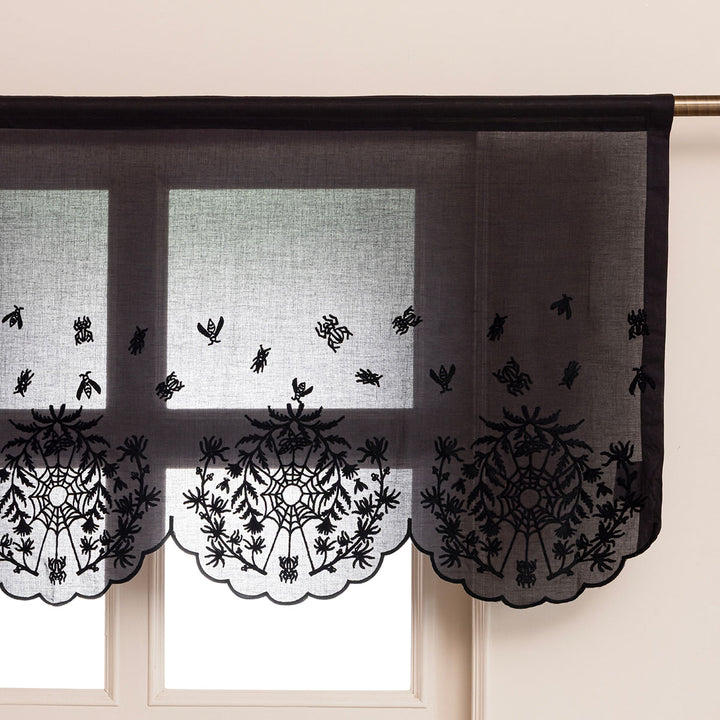 Black cotton window valance with black spider web cottagecore and whimsigoth embroidery.