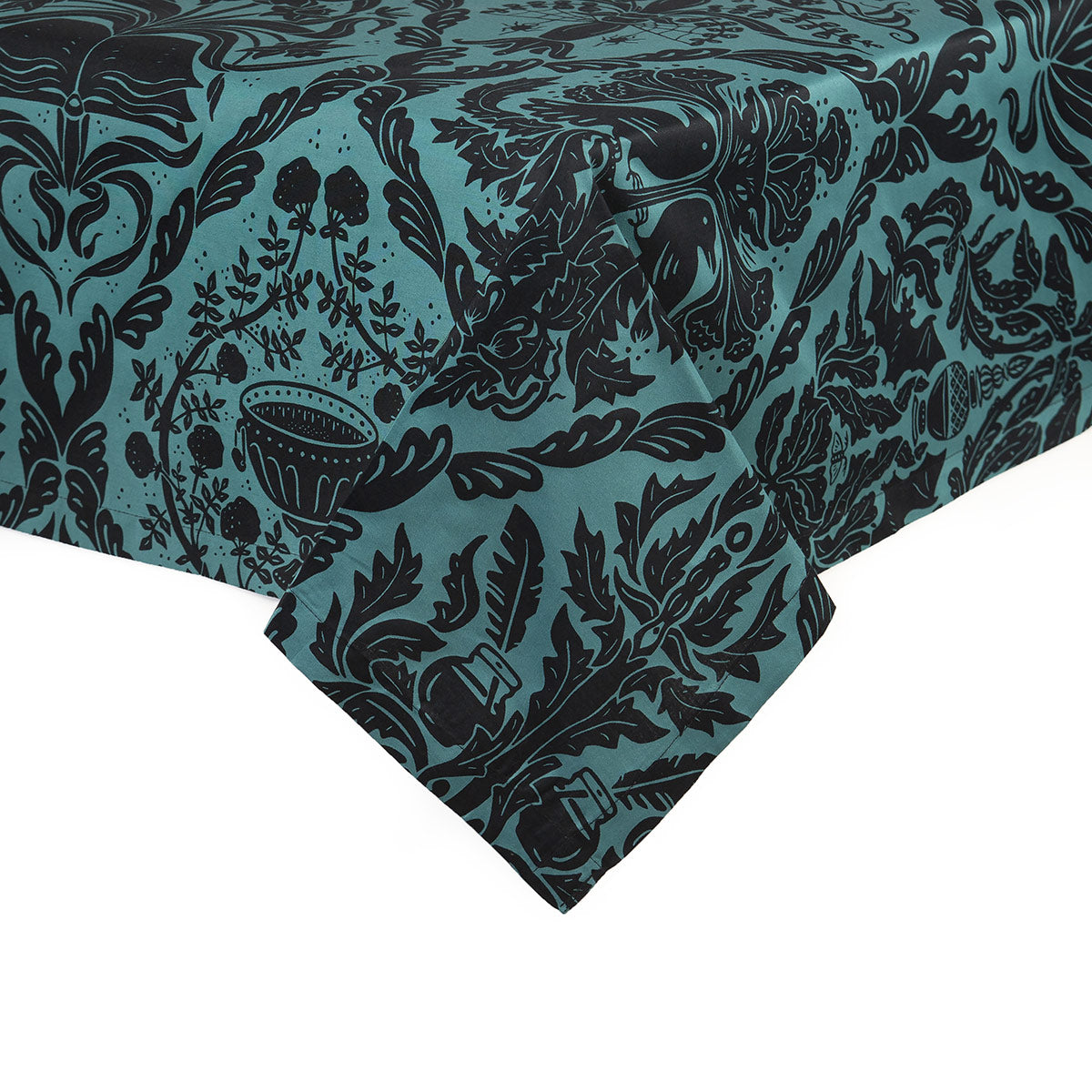 A gothic literature inspired teal and black tablecloth in Sin in Linen's Darker Academia print