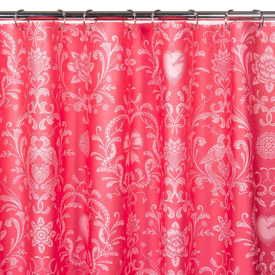 Love Bound in rose by Sin in Linen. A vintage inspired romantic print with bows, serpents, and love birds. 