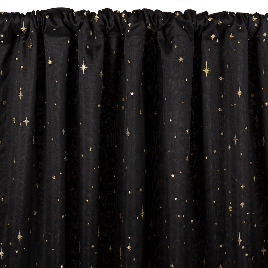 Black semi-sheer curtain with embroidered gold star pattern