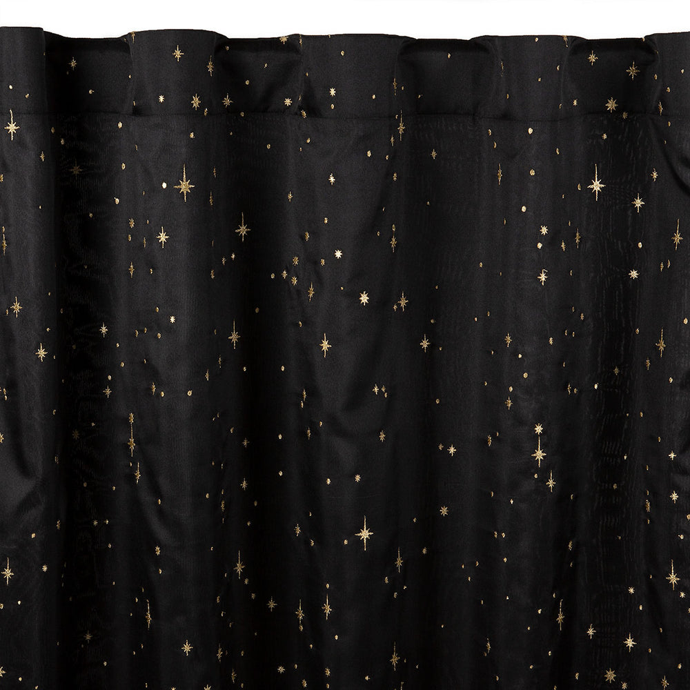 Black semi-sheer curtain with embroidered gold star pattern