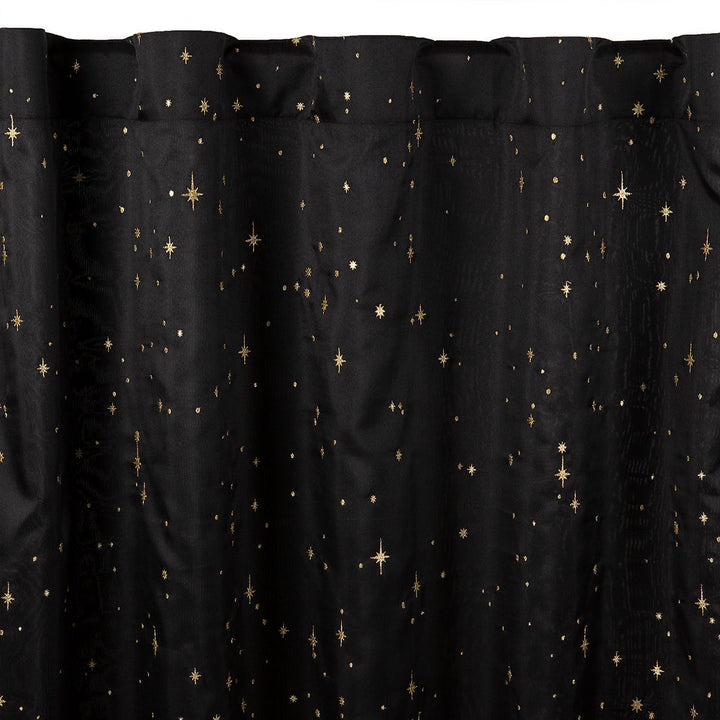Black semi-sheer curtain with embroidered gold star pattern