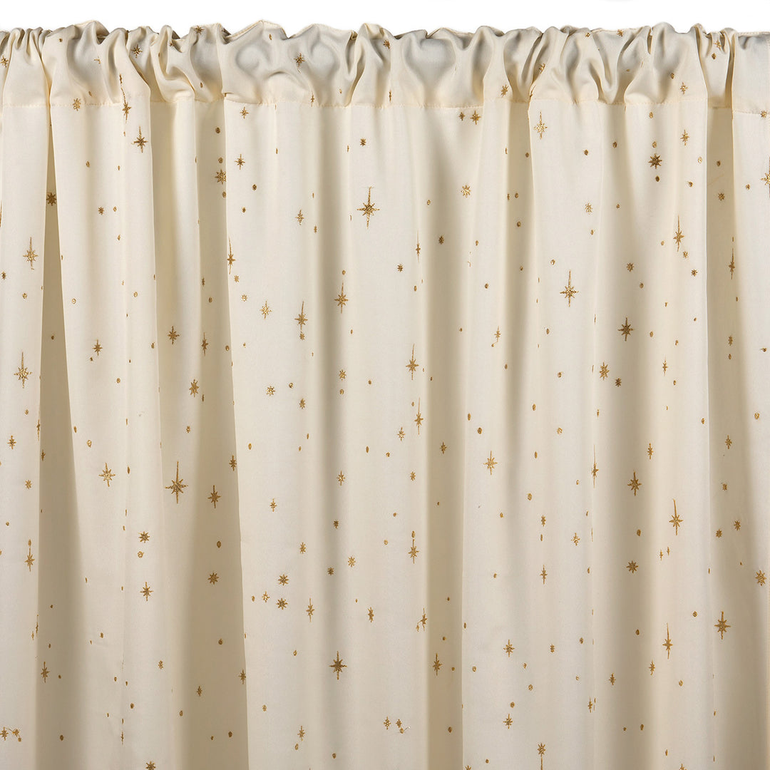 Ivory semi-sheer curtain with embroidered gold star pattern