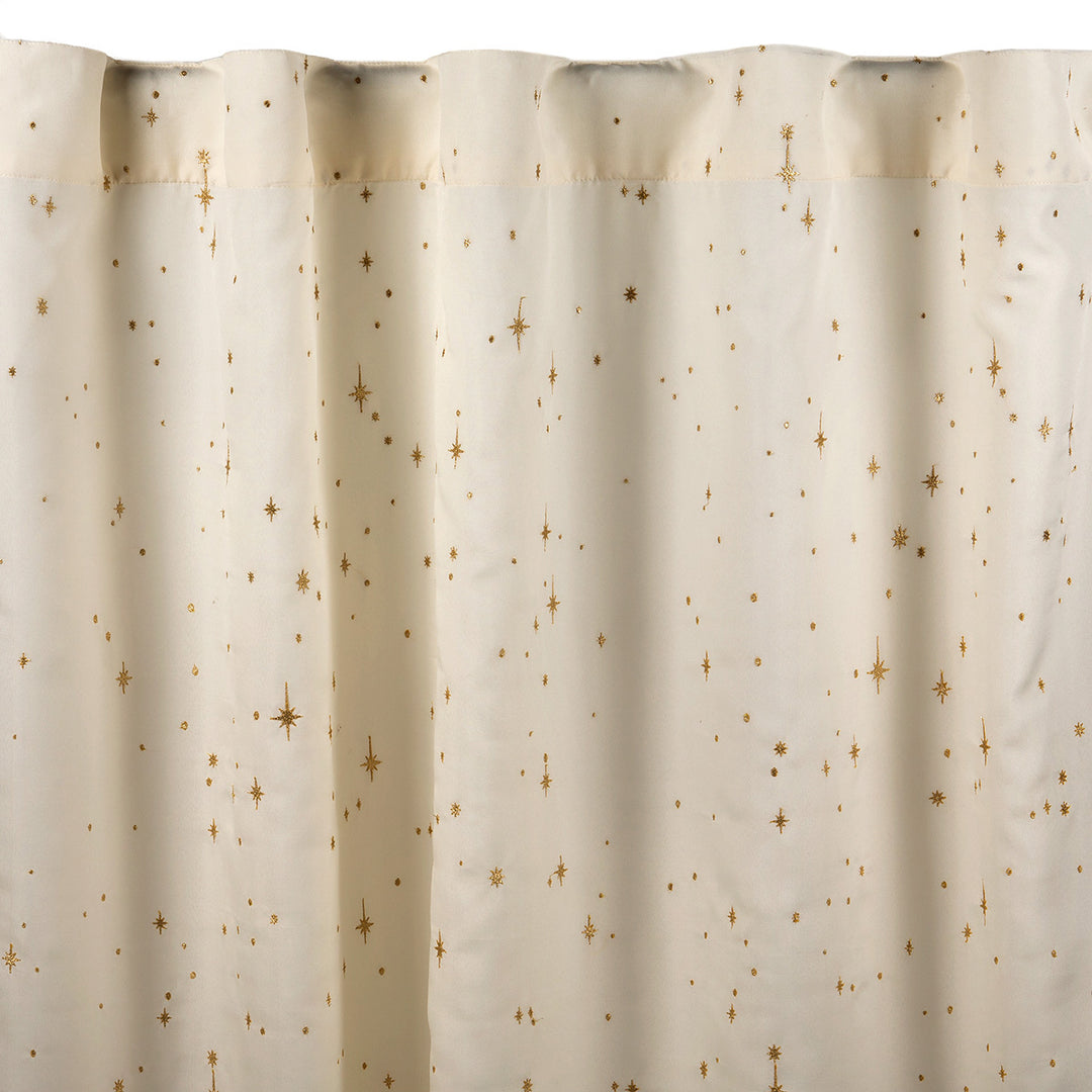 Ivory semi-sheer curtain with embroidered gold star pattern