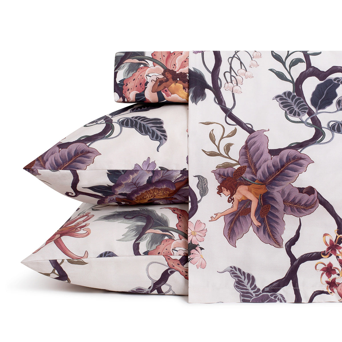 Romantic floral bedding by Sin in Linen. Nymphs bloom out of flowers on a light background in this fairy inspired sheet set. Hues of lilac and rose abound. 