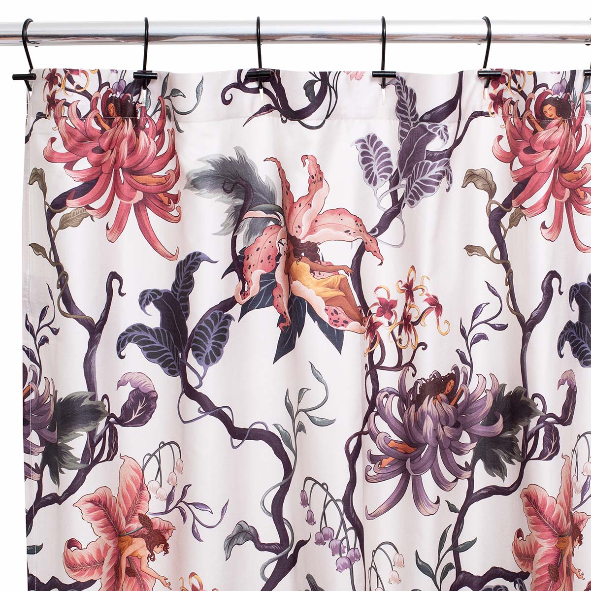 Romantic floral decor by Sin in Linen. Nymphs bloom out of flowers on a light background on this fairy inspired shower curtain. Hues of lilac and rose abound. 
