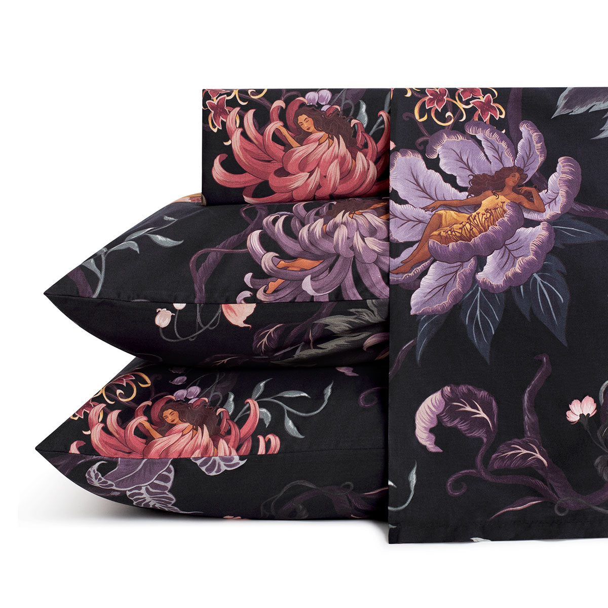 Romantic floral bedding by Sin in Linen. Nymphs bloom out of flowers on a dark background on these fairy inspired sheets. Hues of lilac and rose abound. 