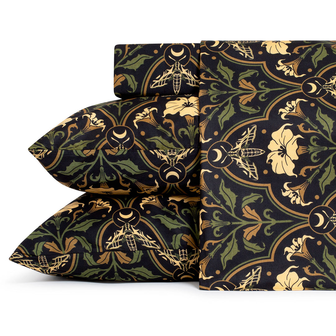 Datura Deco sheet set by Sin in Linen. Gothic Botanical bedding featuring datura blooms, moths, and moons.