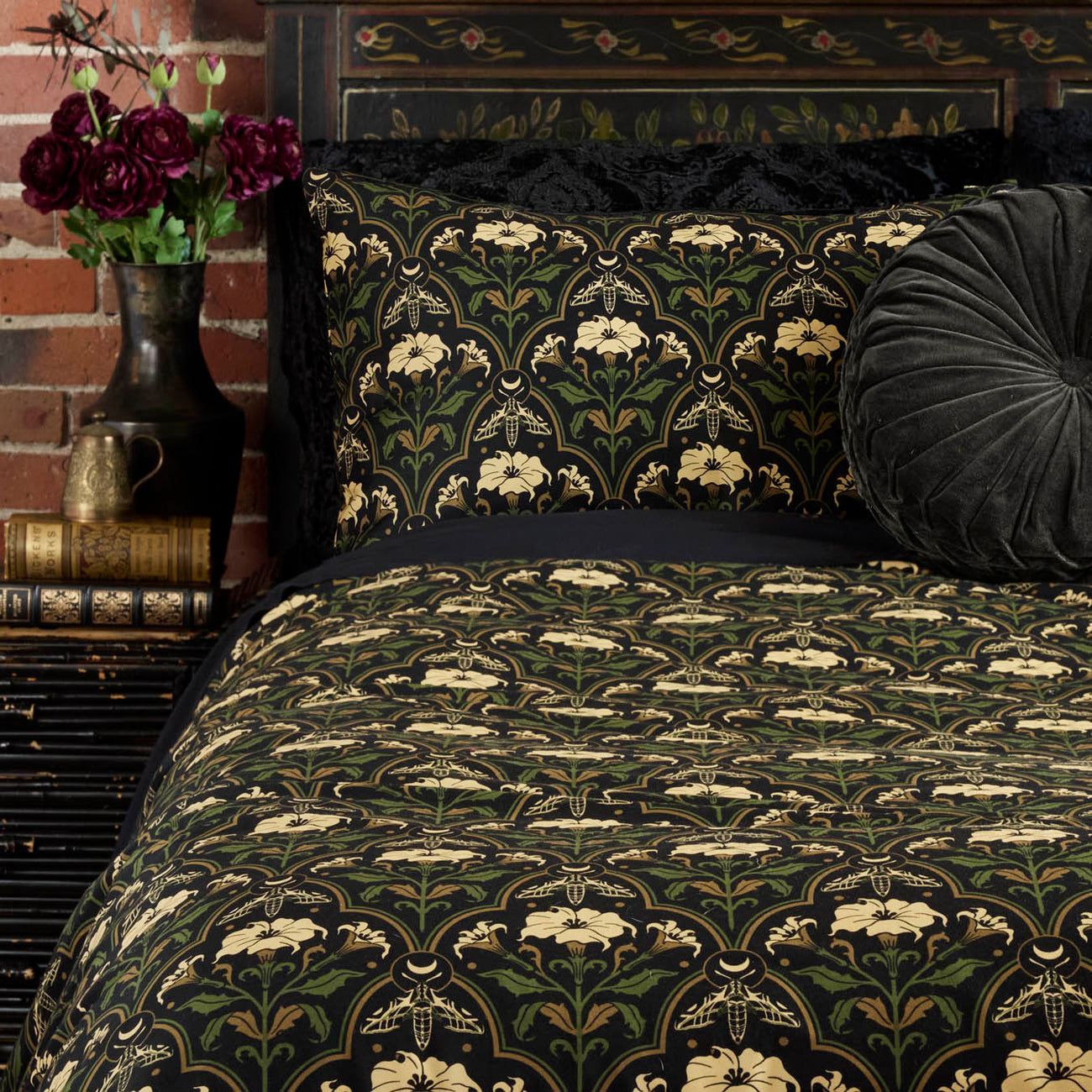 Gothic Botanical Art Deco Duvet Cover with the Datura Deco print featuring moths, gilded accents, and blooming florals. 