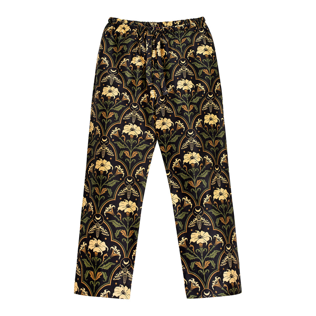 Datura Deco pajamas by Sin in Linen on a white background. Gothic Botanical sleepwear featuring datura blooms, moths, and moons. 