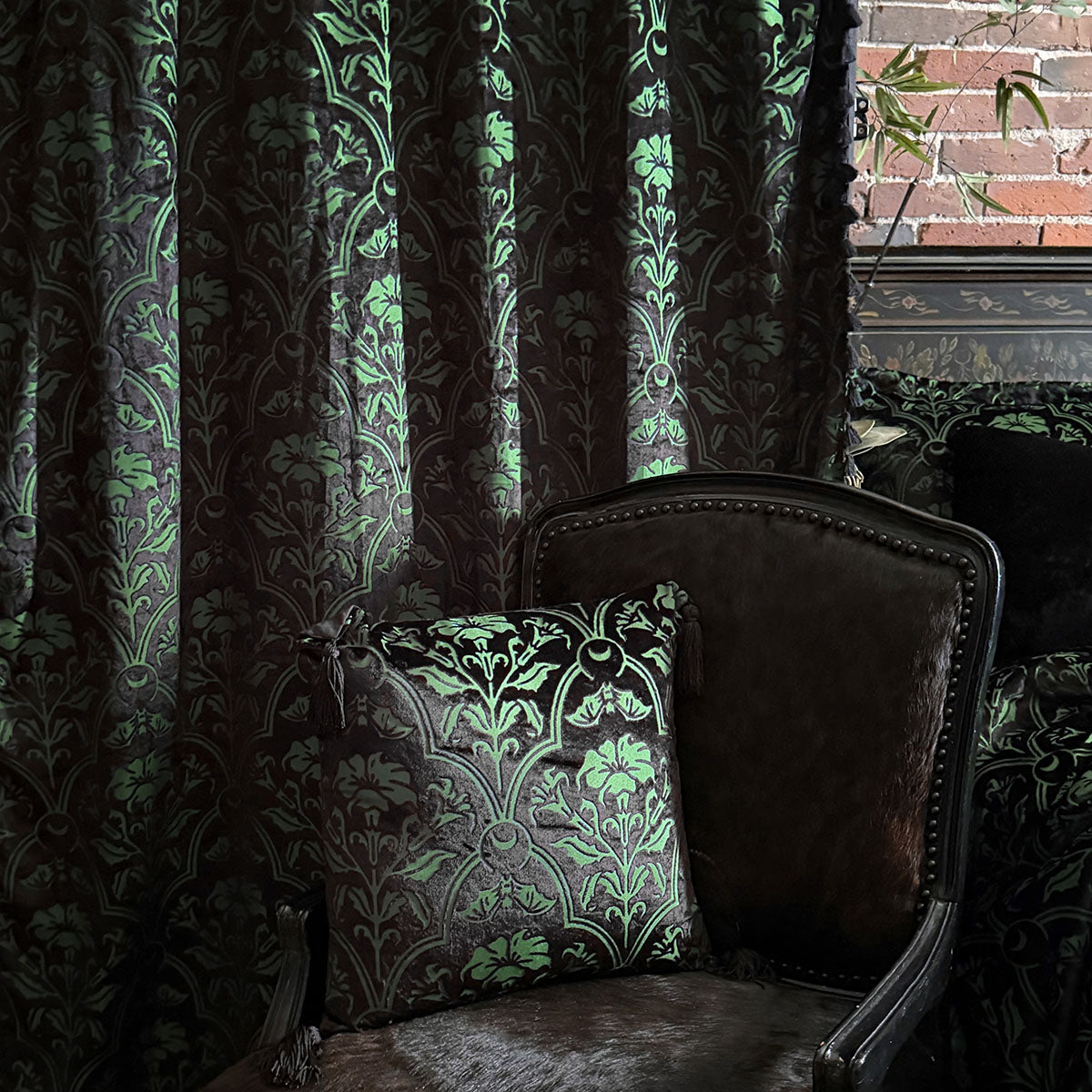 Sin in Linen's Velvet Datura Collection. Green gothic botanical pattern featuring datura blooms and bats in a flocked velvet design. Dark, witchy decor. 