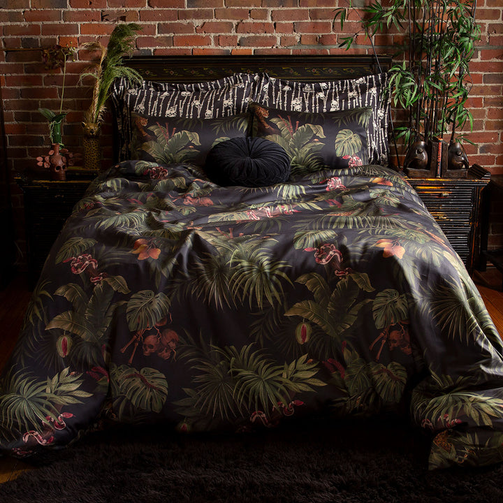 Sin in Linen's Tropical Gothic bedding and decor collection, Forbidden Island. Featuring lush botanicals, leopards, snakes, and vintage Tiki inspired elements, this 100% cotton collection includes duvet covers, pillowcases, curtains, and shower curtains. 