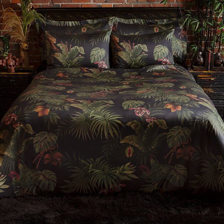 Sin in Linen's Tropical Gothic bedding and decor collection, Jungle Noir. Featuring lush botanicals, leopards, snakes, and vintage inspired elements, this 100% cotton collection includes duvet covers, pillowcases, curtains, and shower curtains. 