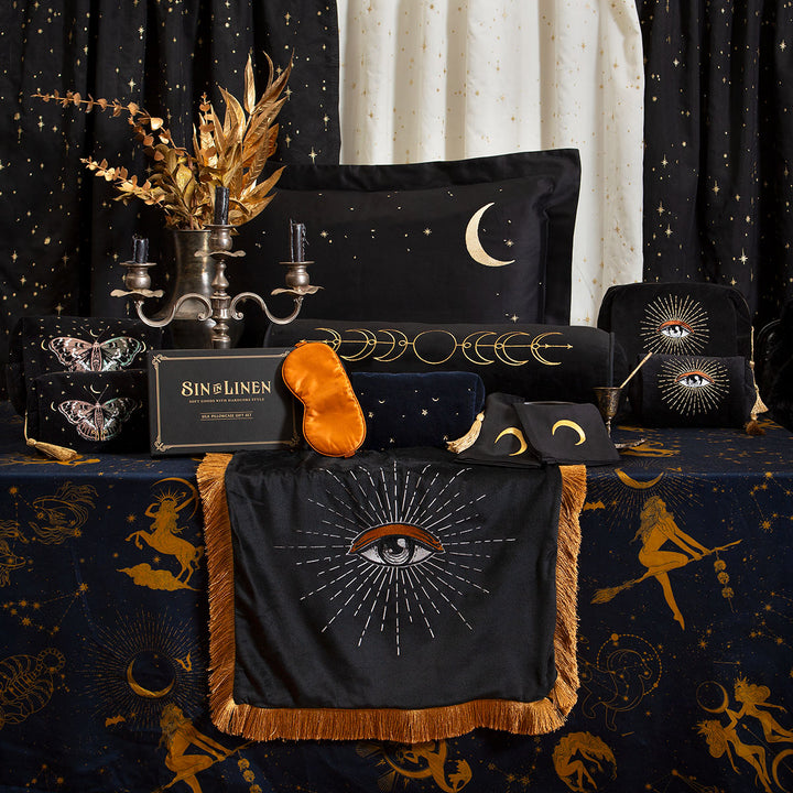 Celestial Inspired decor by Sin in Linen featuring moon phase motifs and magical designs.
