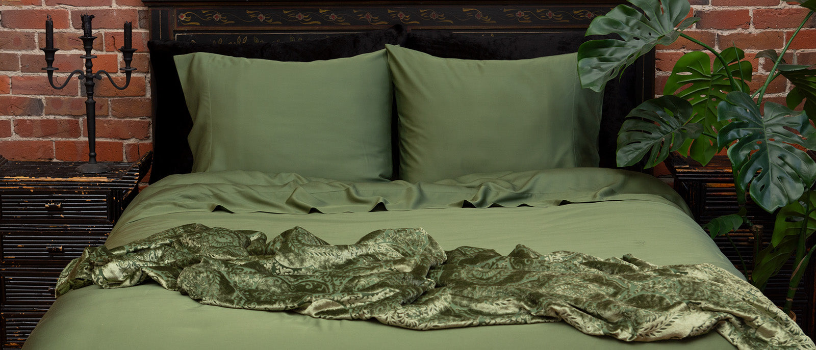 Moss green bamboo bedding with moss green velvet accents