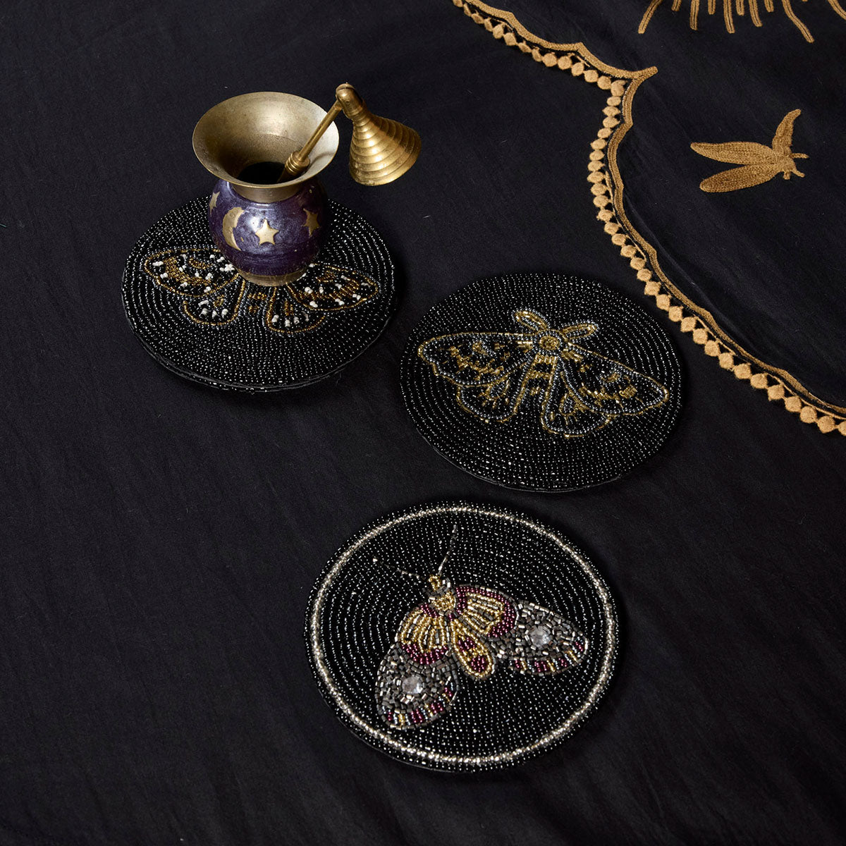 Sin in Linen's beaded Moth Coasters featuring intricate, colorful moths for your witchy, gothic botanical tables and living rooms. 