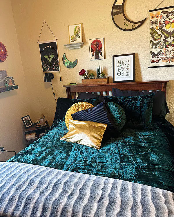 Forest Green Velvet Bedding with throw pillows on it. 
