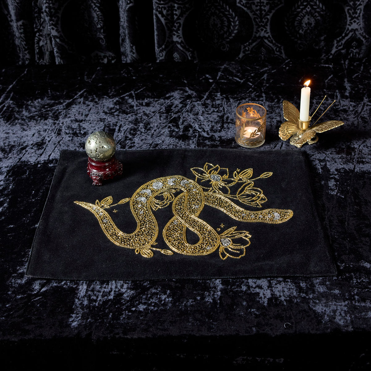 Beaded snake altar cloth in gold by Sin in Linen. The perfect altar cloth or placemat to set your intentions and craft your dark, alternative space. 