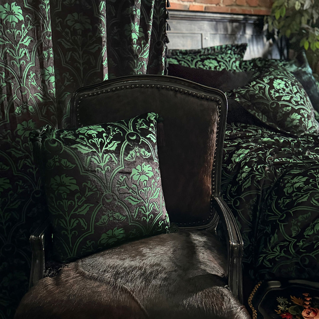 Sin in Linen's Velvet Datura Collection. Green gothic botanical pattern featuring datura blooms and bats in a flocked velvet design. Dark, witchy decor. 