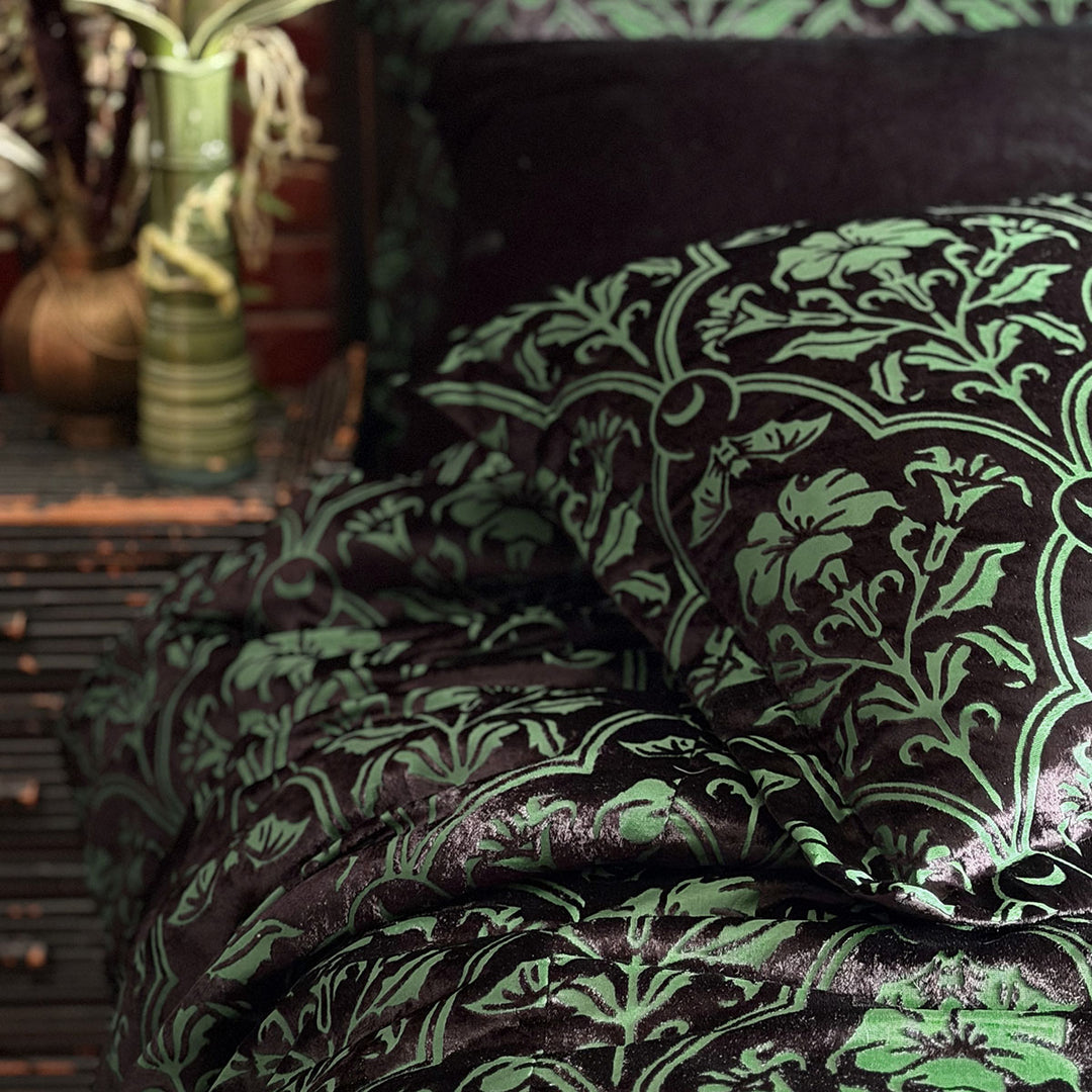 Sin in Linen's Velvet Datura pillowcases. Green gothic botanical pattern featuring datura blooms and bats in a flocked velvet design. Dark, witchy decor. 