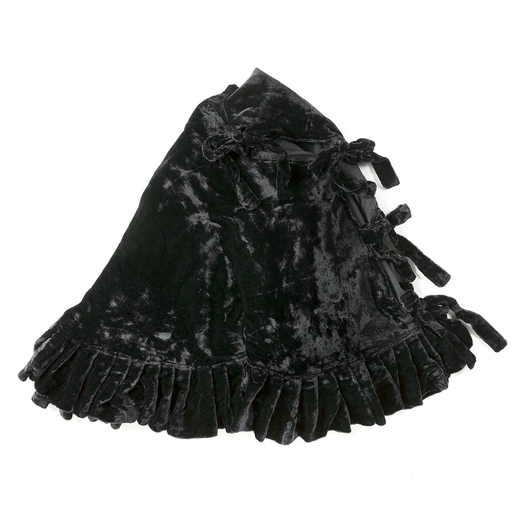Black velvet tree skirt on a white background.
