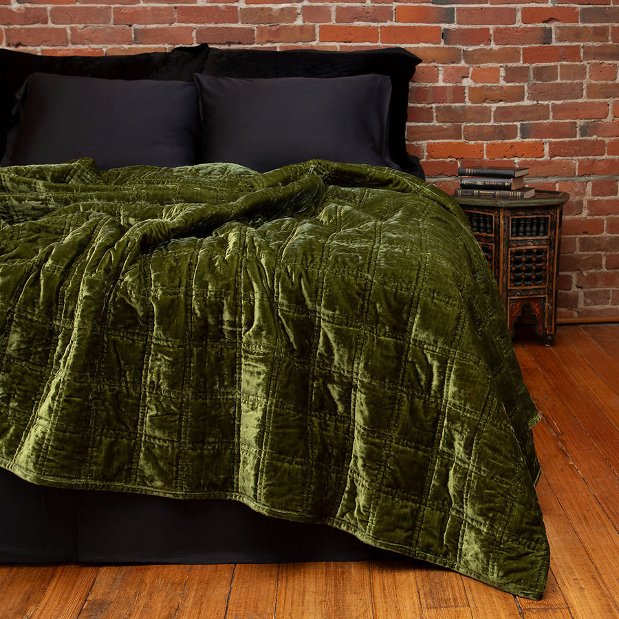 Velvet box quilt in moss green. Lush, botanical inspired velvet bedding.