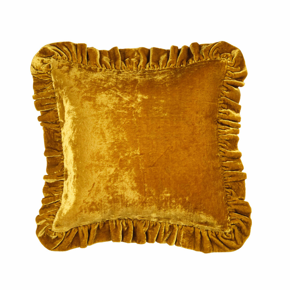 Gold velvet pillow with ruffled edges on a white background