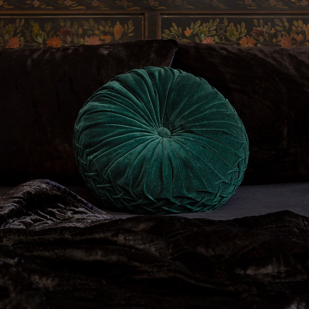 Forest green velvet pintuck pillow on a bed of black velvet bedding. Luxurious throw pillows by Sin in Linen. 