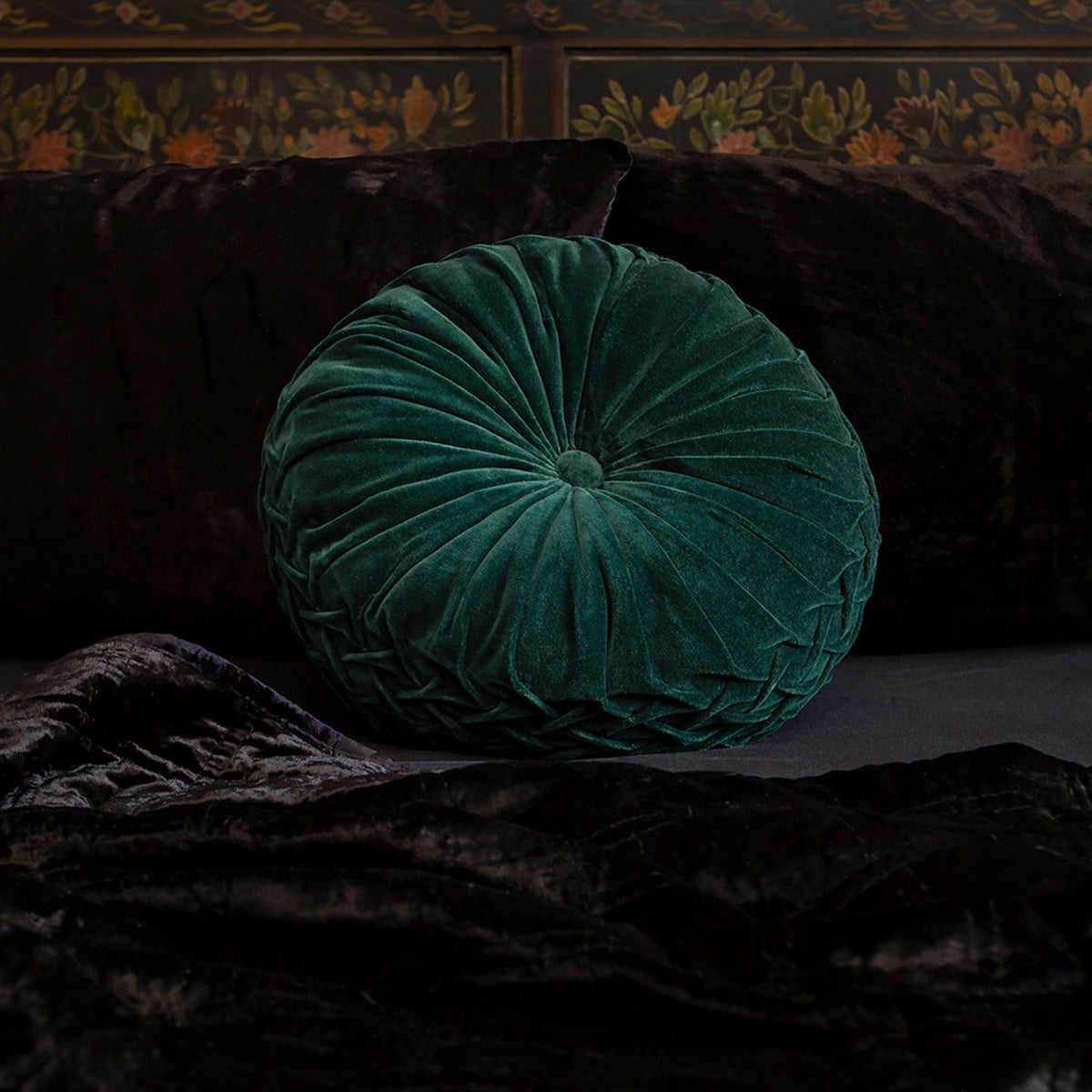 Forest green velvet pintuck pillow on a bed of black velvet bedding. Luxurious throw pillows by Sin in Linen. 