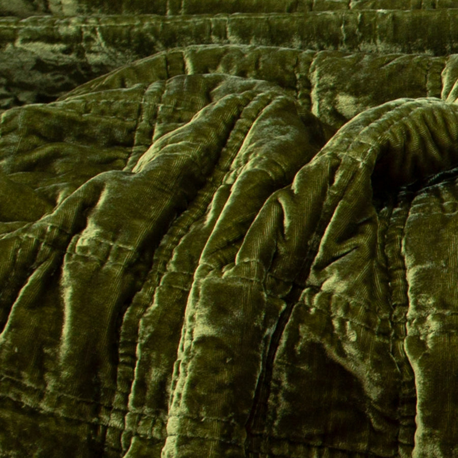 Moss green crushed velvet ruffle throw pillow with ruffled edges. 