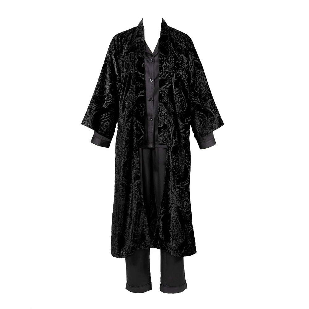 A black damask velvet housecoat with coordinating stripes in the lining. 