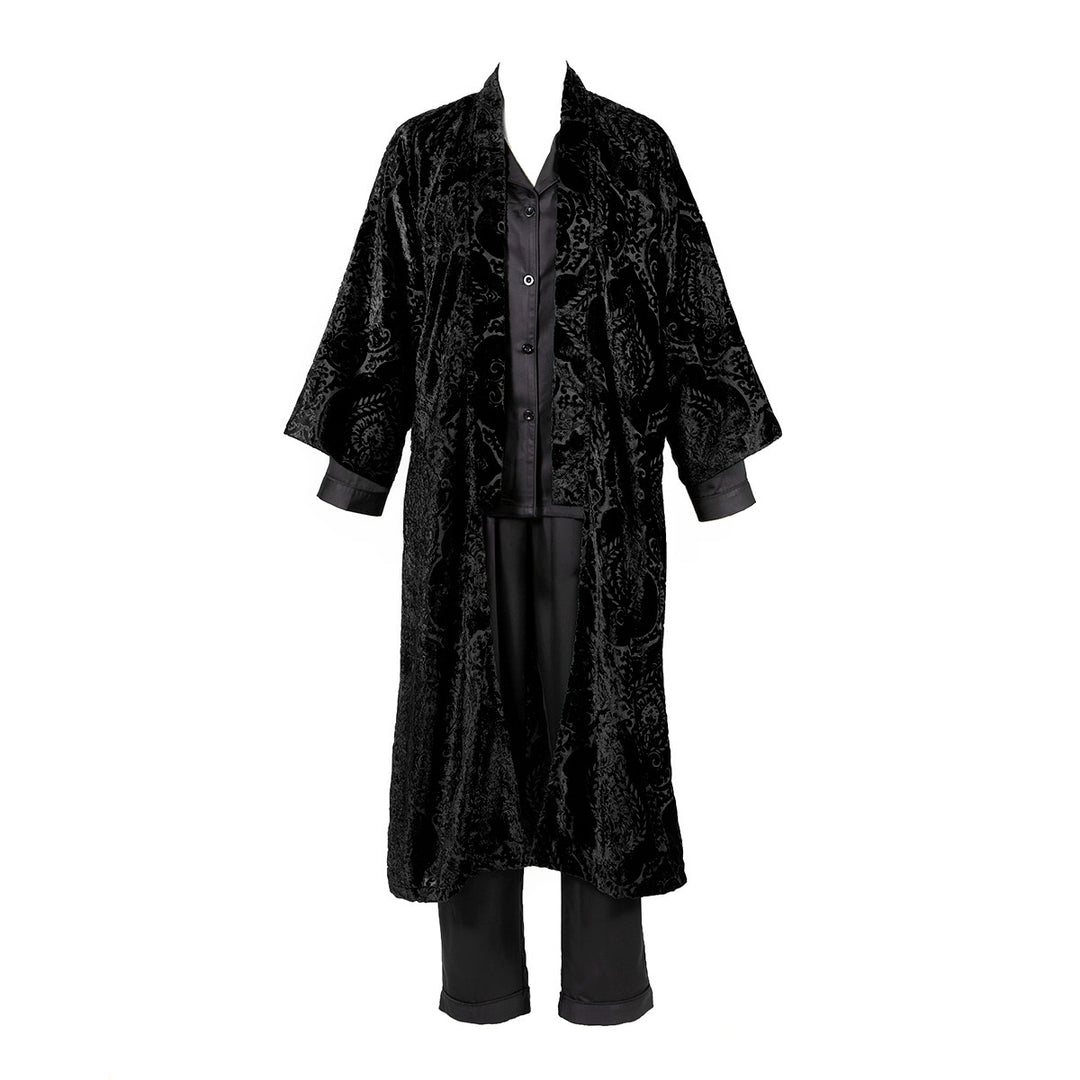 A black damask velvet housecoat with coordinating stripes in the lining. 