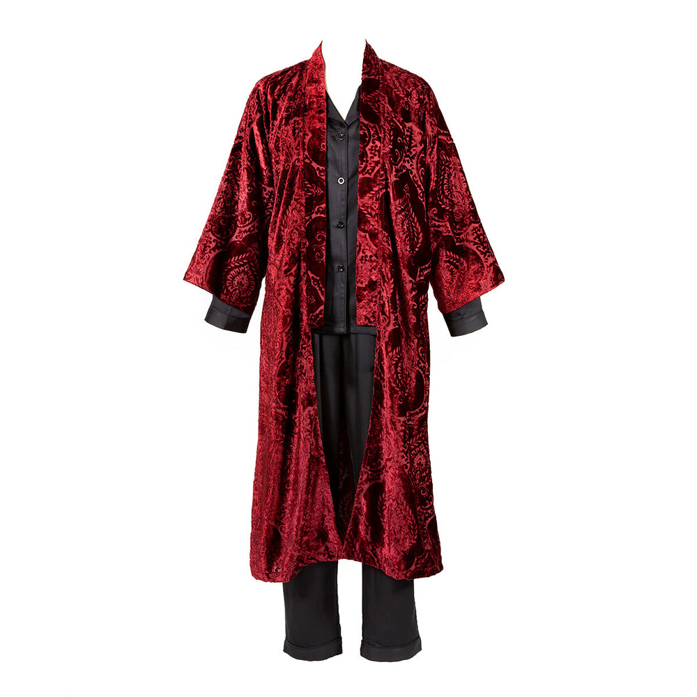 A burgundy ruby red damask velvet housecoat with coordinating stripes in the lining. 