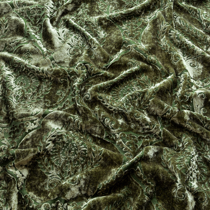 Close up of moss green velvet fabric used for Sin in Linen's damask velvet curtains.